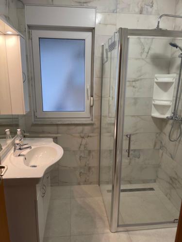 Ένα μπάνιο στο Apartements Delfin Vir