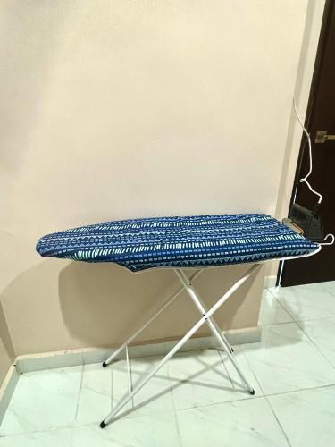 a blue bench sitting on top of a shelf at Nazla Homestay Pendang 2 in Pendang