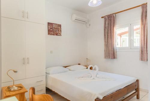 Amazona Apartments and Studiosにあるベッド