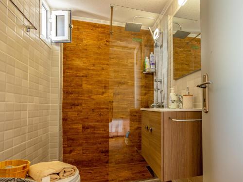 a bathroom with a shower with a toilet and a sink at Frida appartment in Preveza
