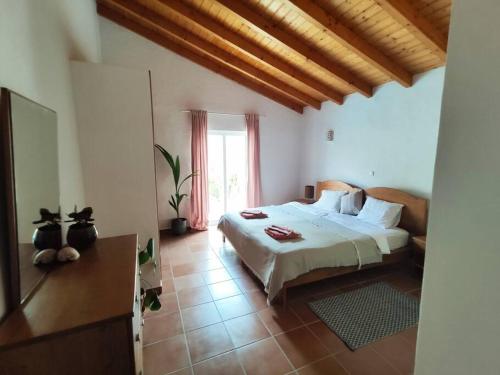 Ένα ή περισσότερα κρεβάτια σε δωμάτιο στο Casa Koala - Lovely villa with pool