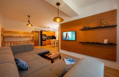 TV/Unterhaltungsangebot in der Unterkunft Apartmany Sileas