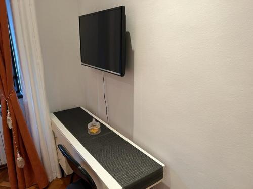 TV a/nebo společenská místnost v ubytování Rooms Aida
