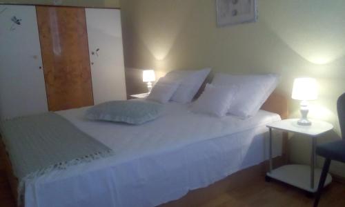 מיטה או מיטות בחדר ב-Apartment Nada