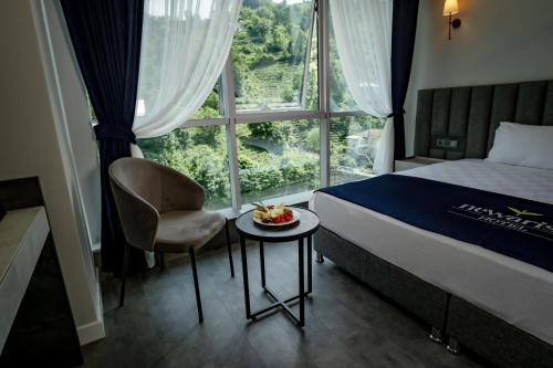 リゼにあるNewarise Hotelのギャラリーの写真