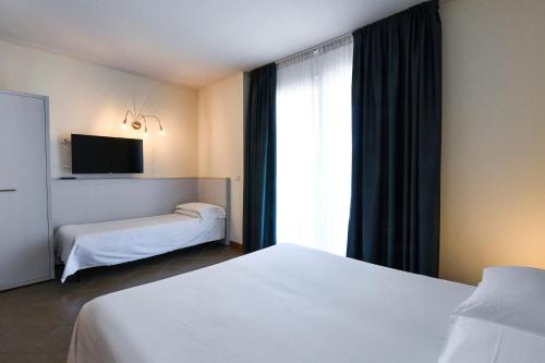 Hotel Edenにあるベッド