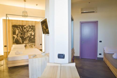Postel nebo postele na pokoji v ubytování Hotel Corallo Rimini