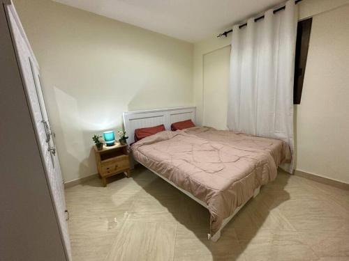 Säng eller sängar i ett rum på One Private Room Sharing Apartment Flat 31 Room 3