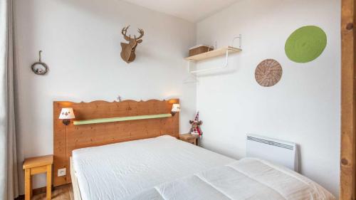 Postel nebo postele na pokoji v ubytování V du Bachat Droseras 16 - Appt 4-5 pers