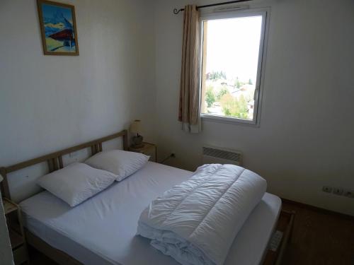 Postel nebo postele na pokoji v ubytování Bel appartement - superbe vue - piscine