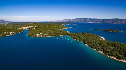 an aerial view of a group of islands in the water at Labranda Senses Resort in Vrboska