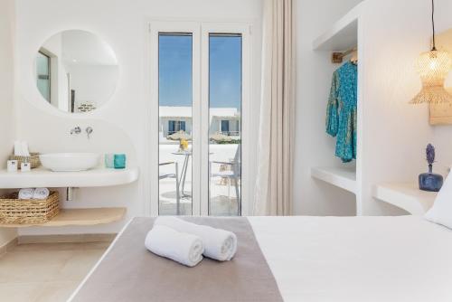 Postel nebo postele na pokoji v ubytování Naxos Leisure