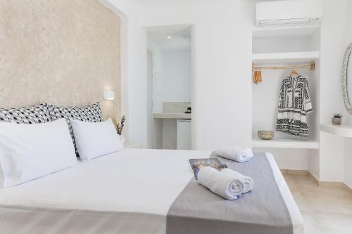 Ένα ή περισσότερα κρεβάτια σε δωμάτιο στο Naxos Leisure