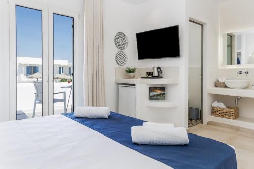 Ένα ή περισσότερα κρεβάτια σε δωμάτιο στο Naxos Leisure