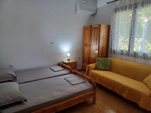 เตียงในห้องที่ Skyros BnB, Calliope in Molos