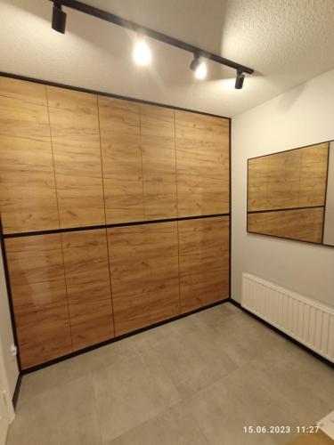 a room with wooden panels on the wall at STUDIO 102 in Bachowice