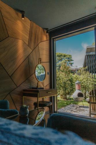 a room with a window with a view of the yard at Newton Hall in Chathill