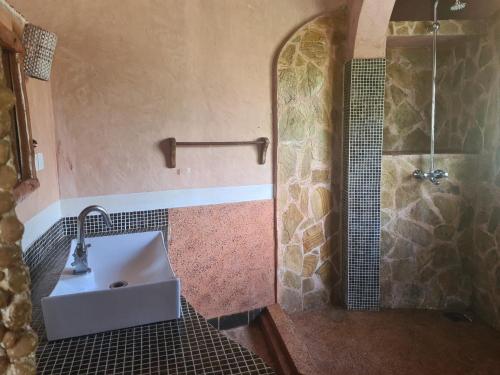 a bathroom with a sink and a shower at Wagawimbi Villa 560 m2, Breathtaking View of the Indian Ocean, Kenya in Shimoni