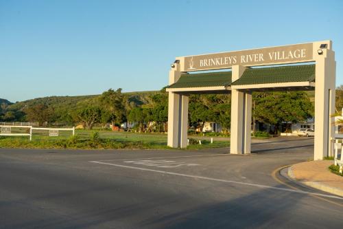a gas station on the side of a road at Brinkley's River Village in Klein Brak Rivier