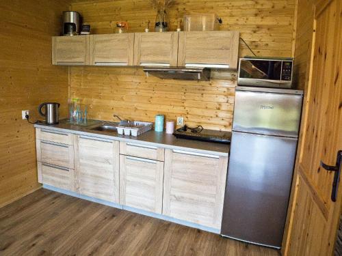 A kitchen or kitchenette at Sea view holiday home in Mielno with balcony