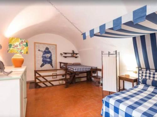 Ένα ή περισσότερα κρεβάτια σε δωμάτιο στο Forte Filippo Porto Ercole by Varental
