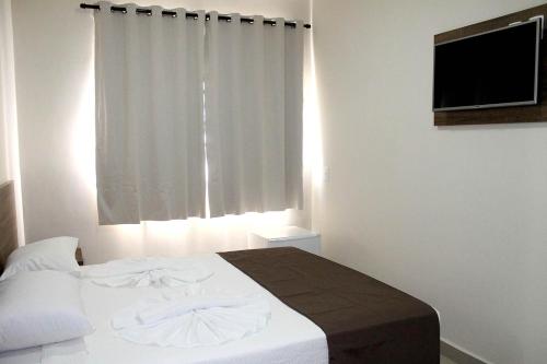 Katil atau katil-katil dalam bilik di Avare Plaza Hotel Plus