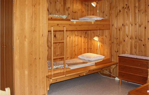 a wooden cabin with two bunk beds in it at Stunning Home In Gll With 1 Bedrooms in Gällö