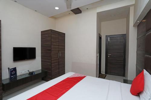 Katil atau katil-katil dalam bilik di Hotel O South Fern