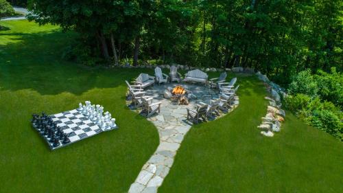 an aerial view of a table and a fire pit at Christmas Farm Inn and Spa in Jackson