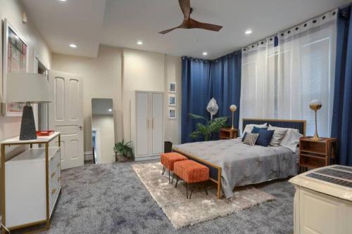 a bedroom with a bed and a table and chairs at Charming Downtown Retreat Steps from Capitol Bldg in Harrisburg