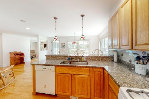 a kitchen with a sink and a counter top at Four Seasons in Ellsworth
