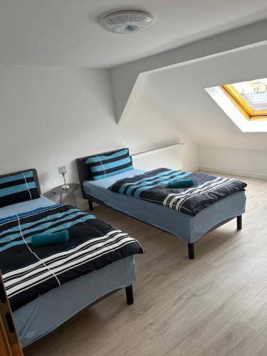 Säng eller sängar i ett rum på Apartment Ferien Wohnung
