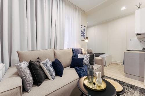 Khu vực ghế ngồi tại Apartamenty Wyspa Solna by Vacation Rental - basen, sauna, jacuzzi, siłownia w cenie