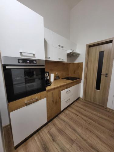Kuchyňa alebo kuchynka v ubytovaní Apartmán Viki
