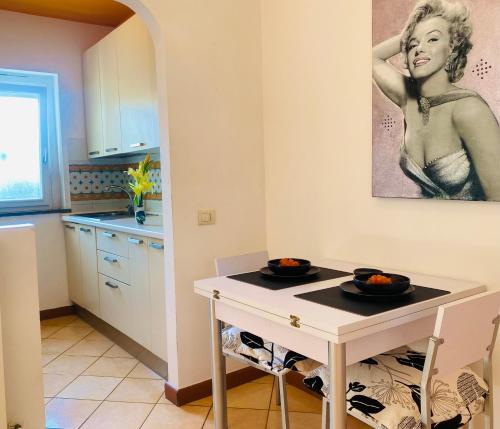 Kuchyň nebo kuchyňský kout v ubytování Villaggio I Giardini del Conero