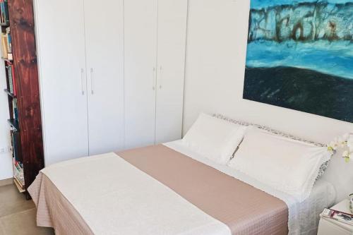 Een bed of bedden in een kamer bij Casa Migliore