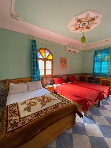 Postel nebo postele na pokoji v ubytování Maroc Galacx