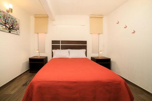 Katil atau katil-katil dalam bilik di Capital O Hotel Boutique Las Torres
