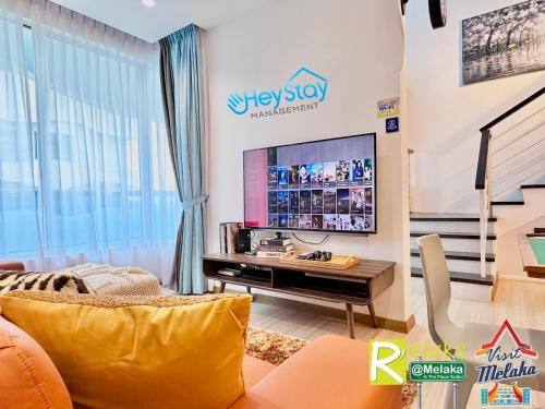TV a/nebo společenská místnost v ubytování TheWave Residence By Heystay Management