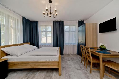 Un pat sau paturi într-o cameră la Willa Marina