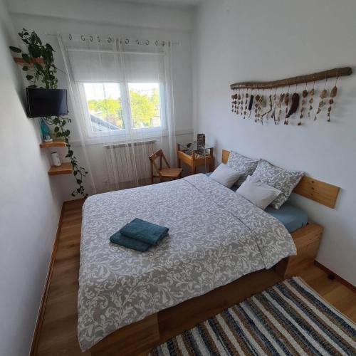 Postel nebo postele na pokoji v ubytování sobe Divna