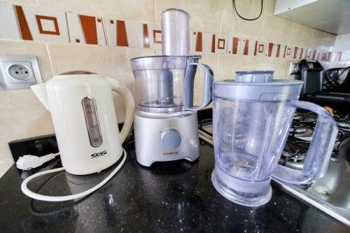 two blenders sitting on a counter in a kitchen at Apartment for rent with 3 bedrooms in Tangier