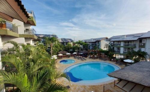 Tầm nhìn ra hồ bơi gần/tại Belluno Apart Hotel