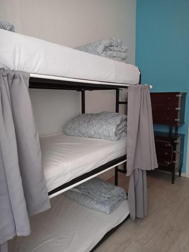 a couple of bunk beds in a room at Party Zone in Lisbon
