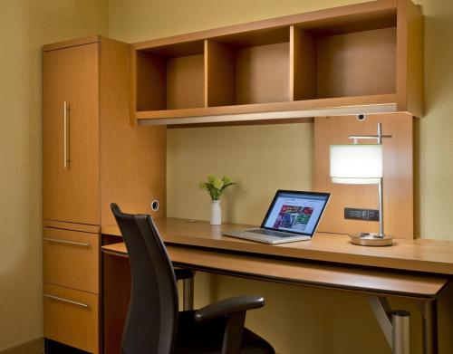 a laptop computer sitting on a desk in a room at TownePlace Suites by Marriott Findlay in Findlay