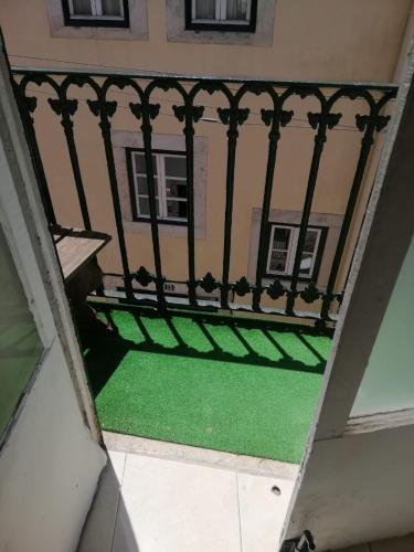 an overhead view of a balcony with green grass at Party Zone in Lisbon