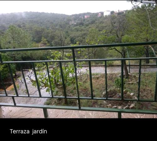 a view of a river from a balcony at Increíble Casa Rural en la Sierra de Altomira Piscina privada y Barbacoa in Albalate de Zorita