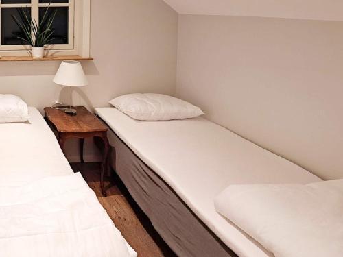 Katil atau katil-katil dalam bilik di Holiday home STRÅVALLA II