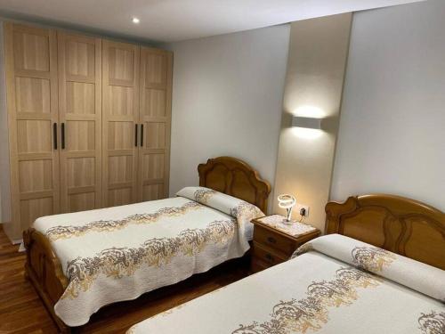 Кровать или кровати в номере Casa de María