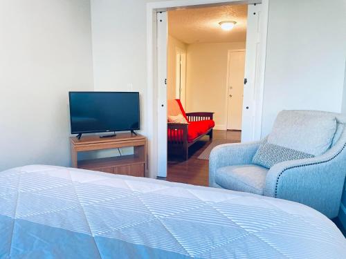 TV a/nebo společenská místnost v ubytování South Zion Inn and Suites
